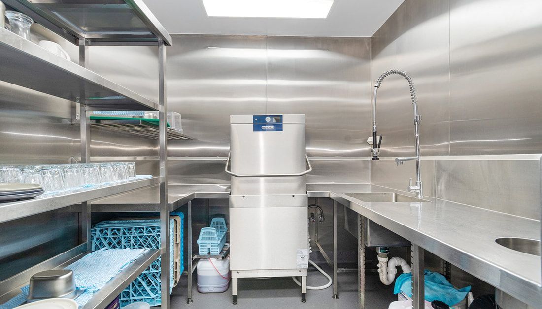 Kitchen with Dishwasher and Steel Shelves — Townsville Stainless Steel in Garbutt, QLD