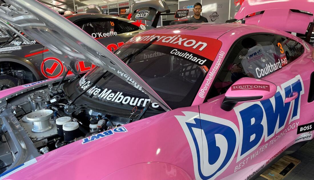 A Pink Race Car with The Hood Open Is Parked in A Garage — Townsville Stainless Steel in Garbutt, QLD