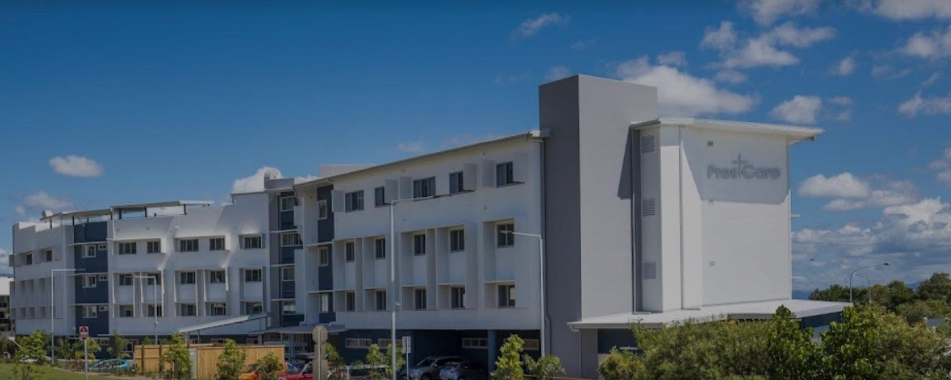 A Large White Building with A Lot of Windows — Townsville Stainless Steel in Garbutt, QLD