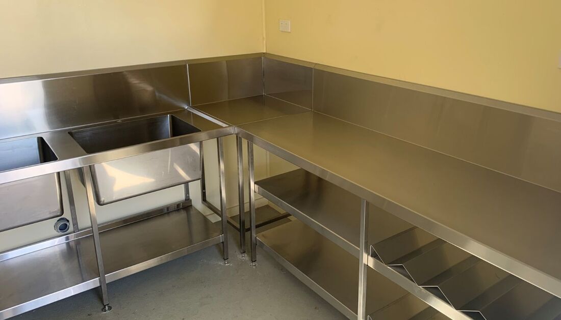 A Kitchen with Stainless Steel Counter Tops and Sinks — Townsville Stainless Steel in Garbutt, QLD