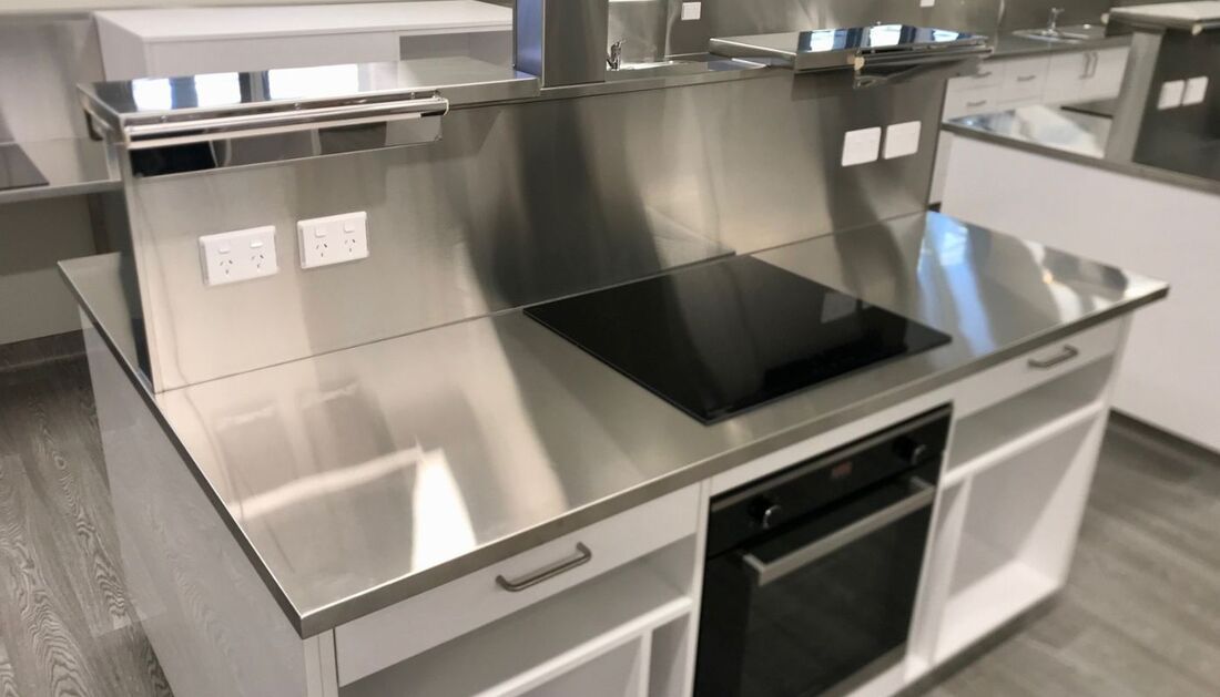 A Kitchen with A Stainless Steel Counter Top and A Stove Top Oven — Townsville Stainless Steel in Garbutt, QLD
