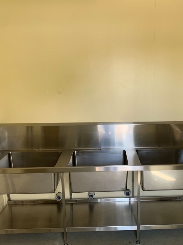 A Stainless Steel Kitchen Sink with Two Sinks and A Shelf  — Townsville Stainless Steel in Garbutt, QLD