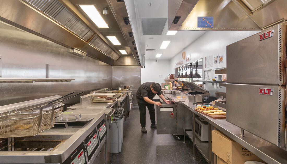 Metal Cabinet and Exhaust in Kitchen — Townsville Stainless Steel in Garbutt, QLD