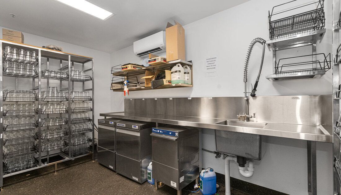 Steel Shelves with Glasses Beside Steel Cabinet — Townsville Stainless Steel in Garbutt, QLD