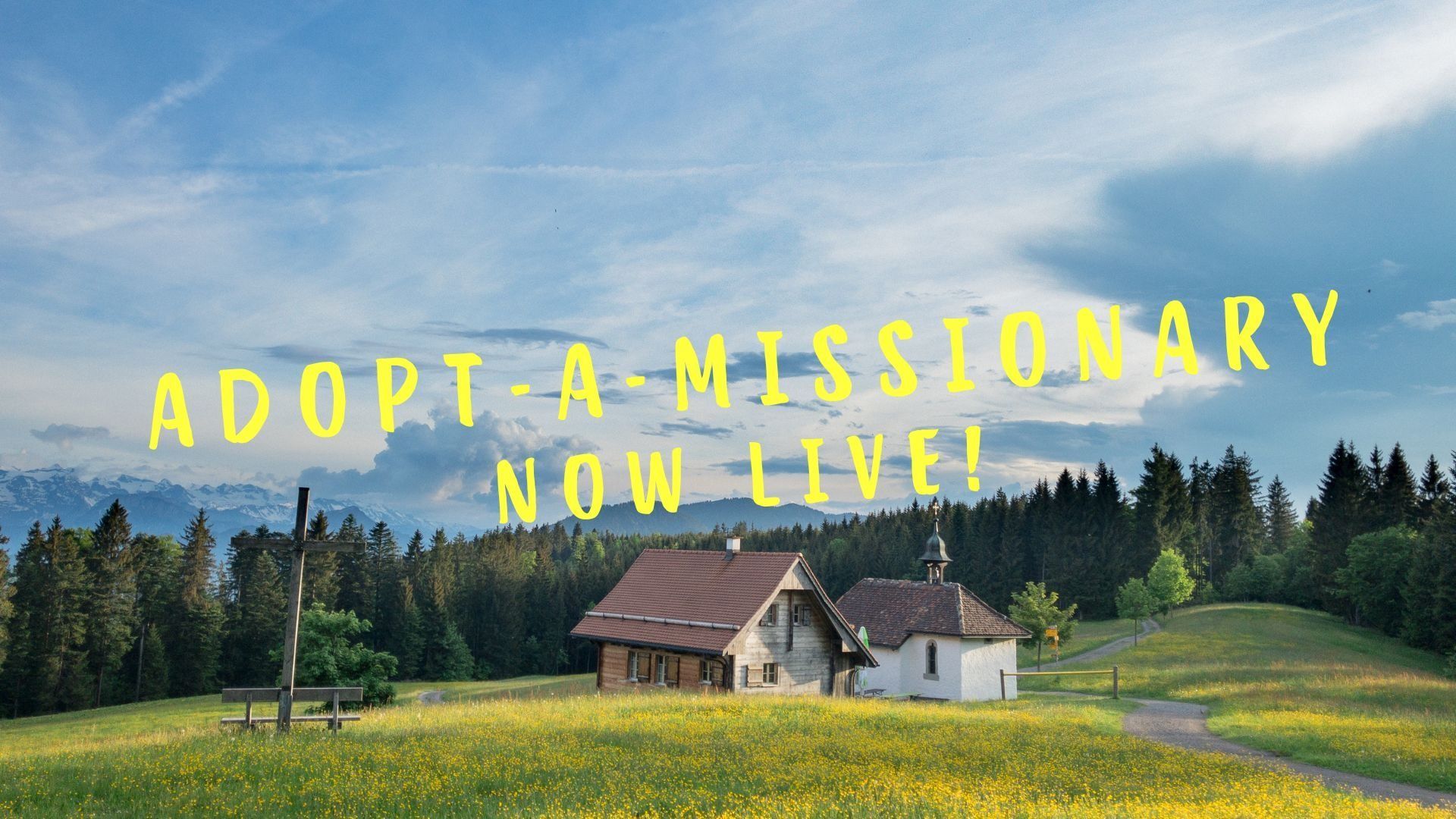 A house in a field with the words adopt a missionary now live