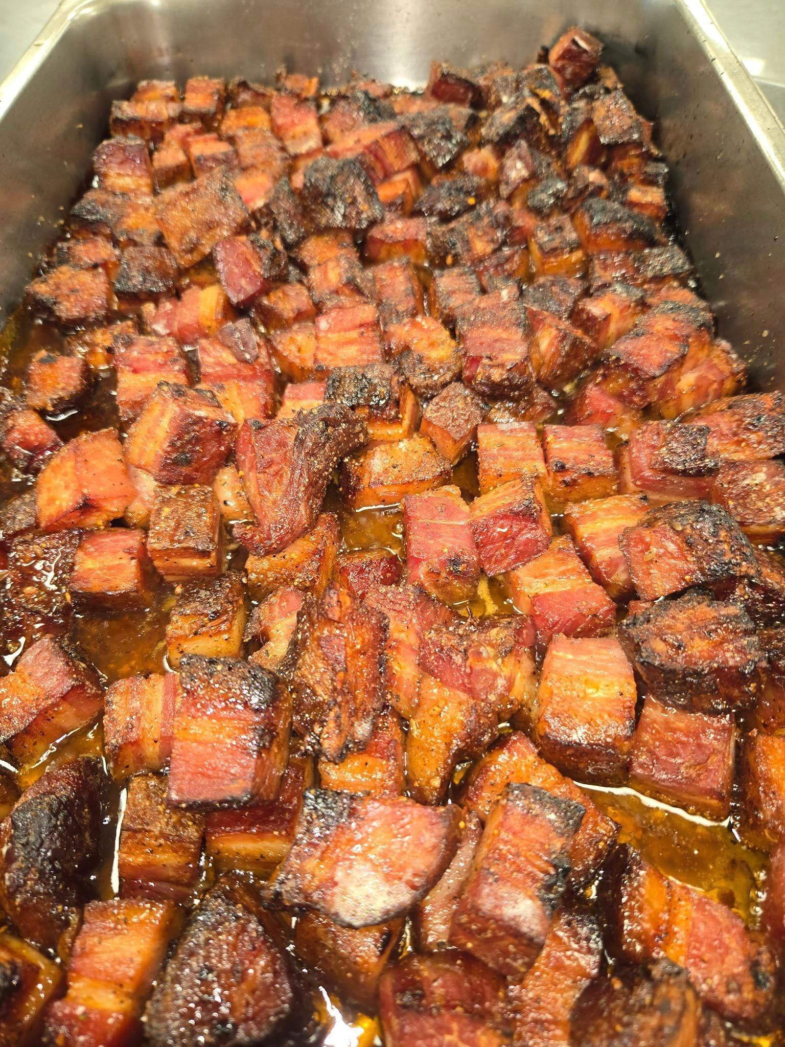 There is a lot of burnt ends in the pan.
