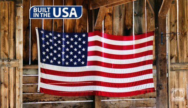 American flag built in the USA wood background