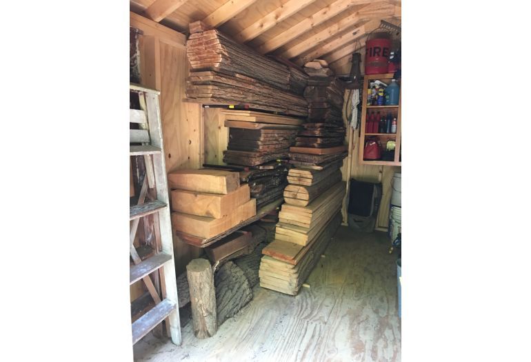 Lumber stacks in a shed