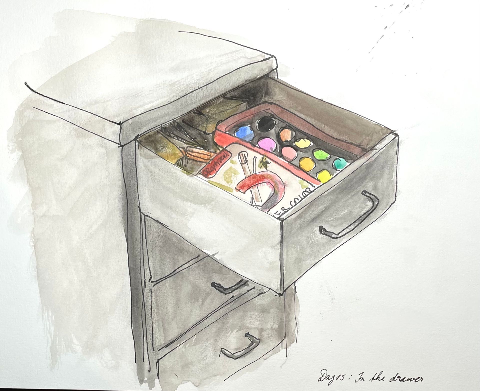 Een open lade van een archiefkast met teken- en schildersbenodigdheden: verf, penselen en een schetsboek.