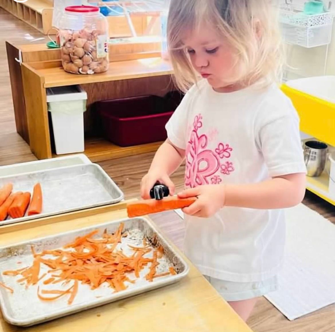 Montessori cutting carrots 