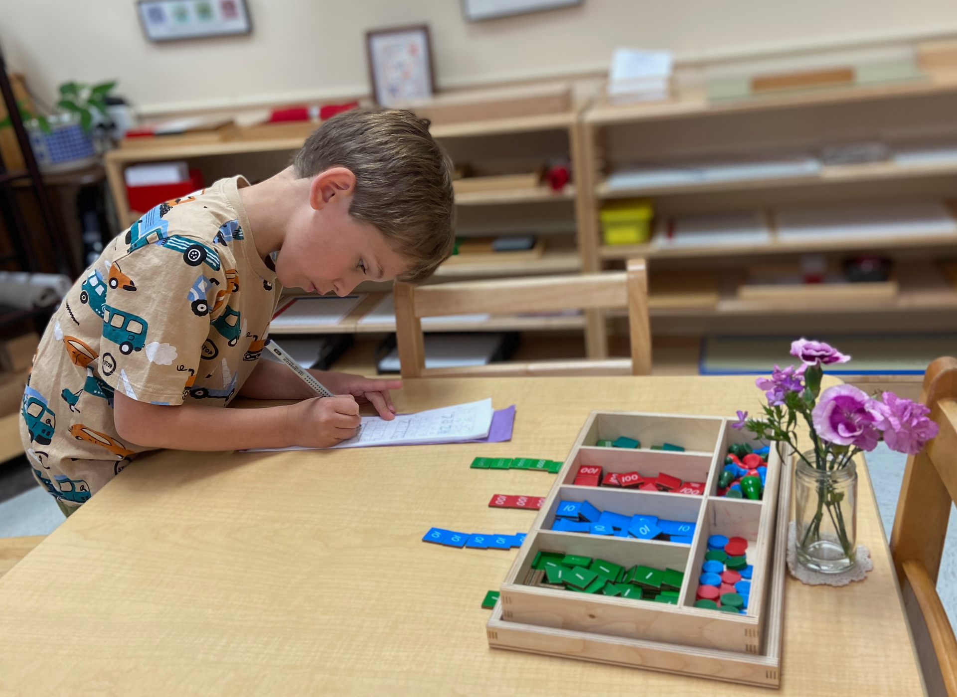 Child working with the Montessori materials