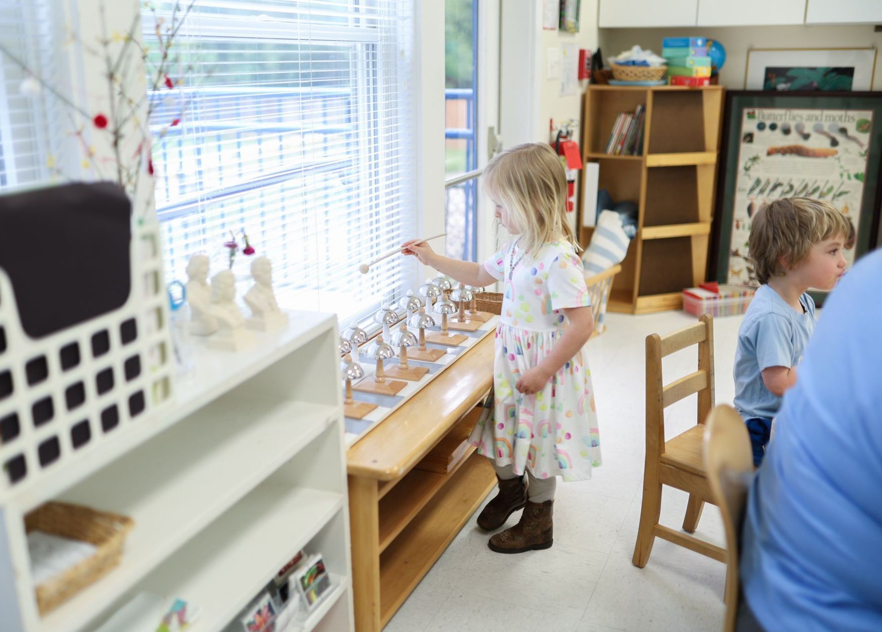 Child's working with Montessori materials