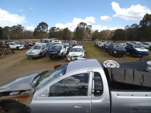 A Warehouse Filled With Lots Of Car Parts On Shelves — Old Bar Wreckers In Wauchope, NSW