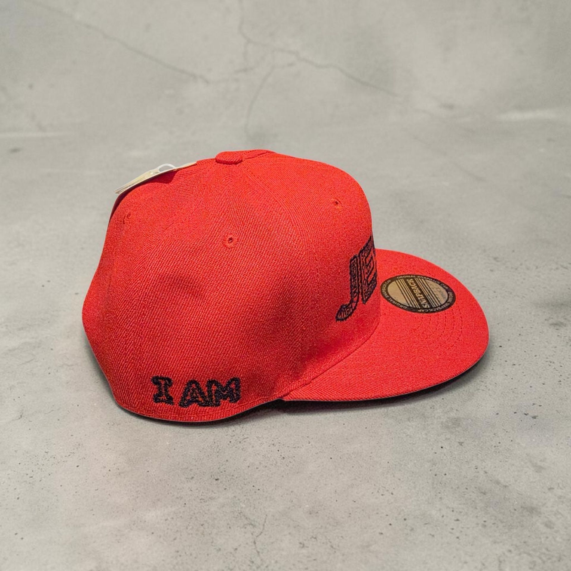 Red hat with black letters