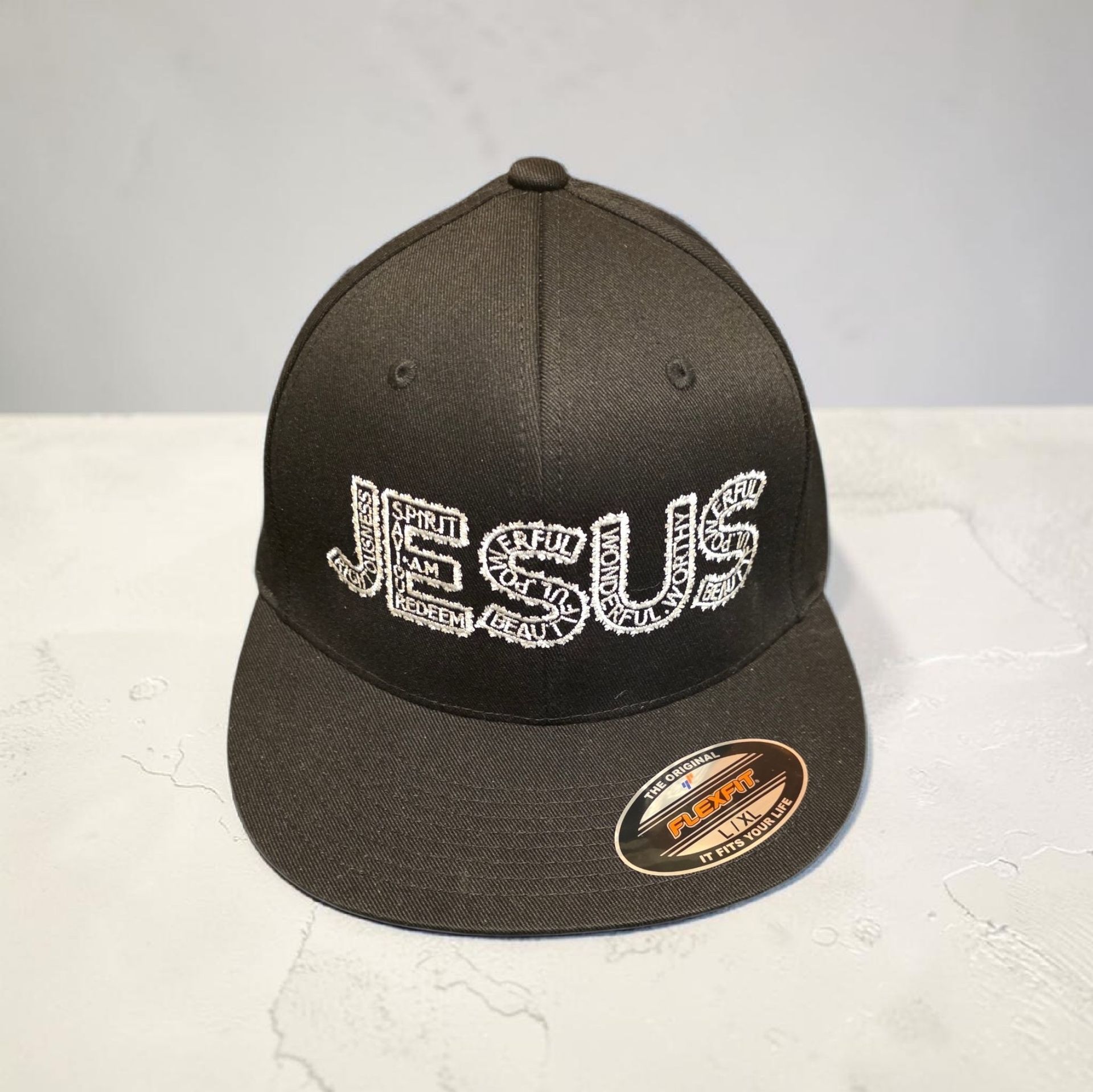 Black hat with white letters