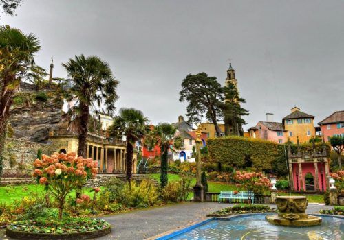 there is a fountain in the middle of the park .