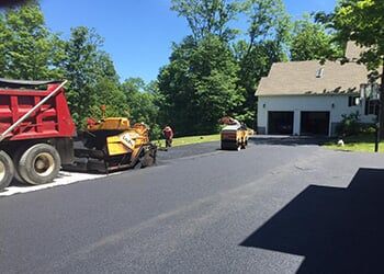 Service Truck on road — Concrete Work in Brewster, NY