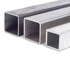 Three square metal pipes are stacked on top of each other on a white surface.