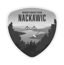 Destination Nackawic badge: Gray-scale landscape, river, bridge, trees, and text 