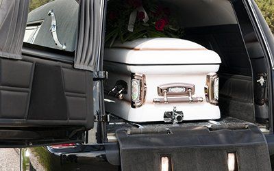 funeral car with the coffin box in it