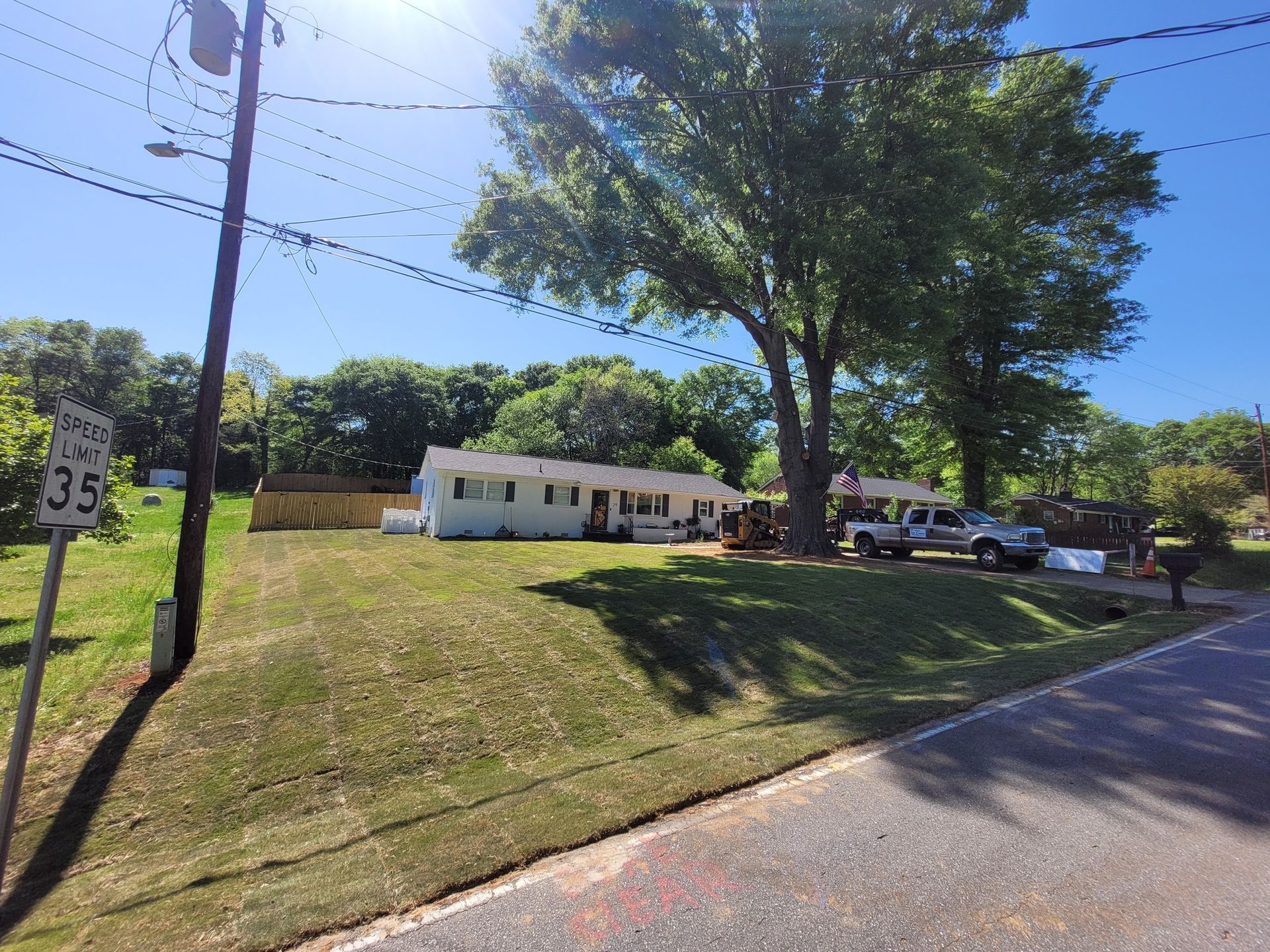 Placeholder image of mountains with a sun or moon in the background.