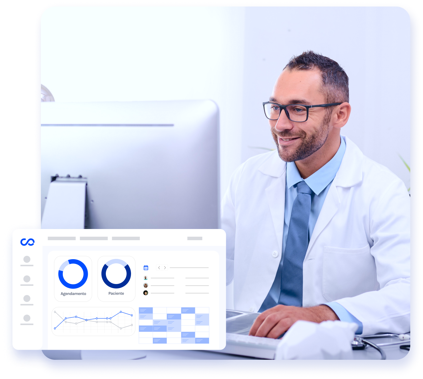 Um médico está sentado em uma mesa em frente a um computador.