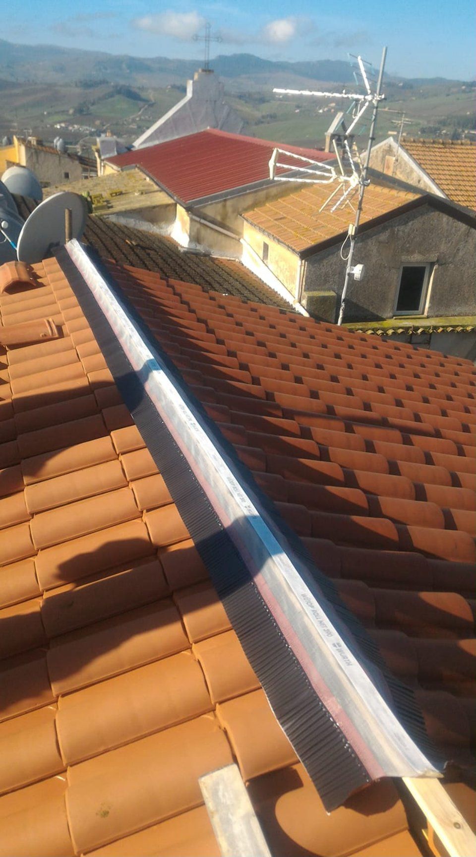 tetto palazzina dopo lavori di rifacimento