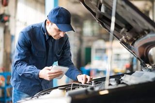 Mechanic using tablet — Car Inspections in Cape May, New Jersey
