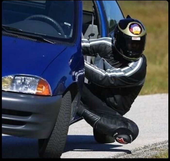 Biker in car