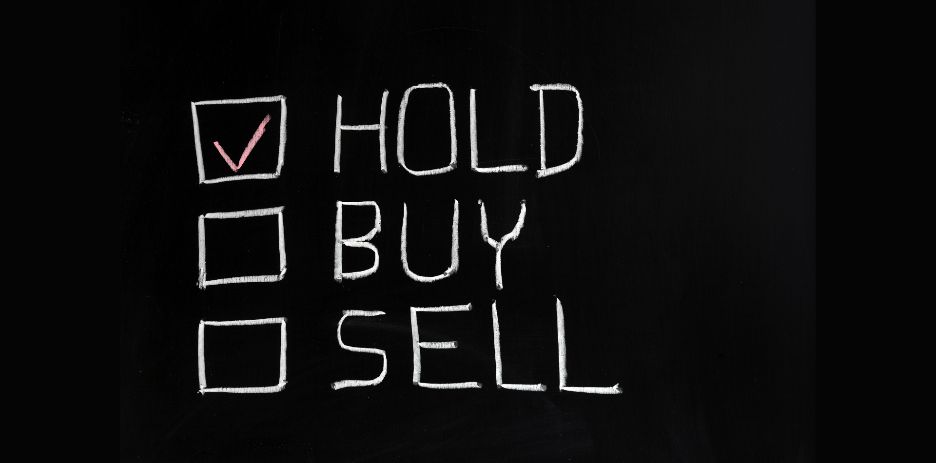 Man trading stocks on a computer screen