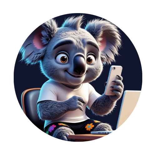 Ozzy the koala bear is sitting in front of a laptop and holding a cell phone