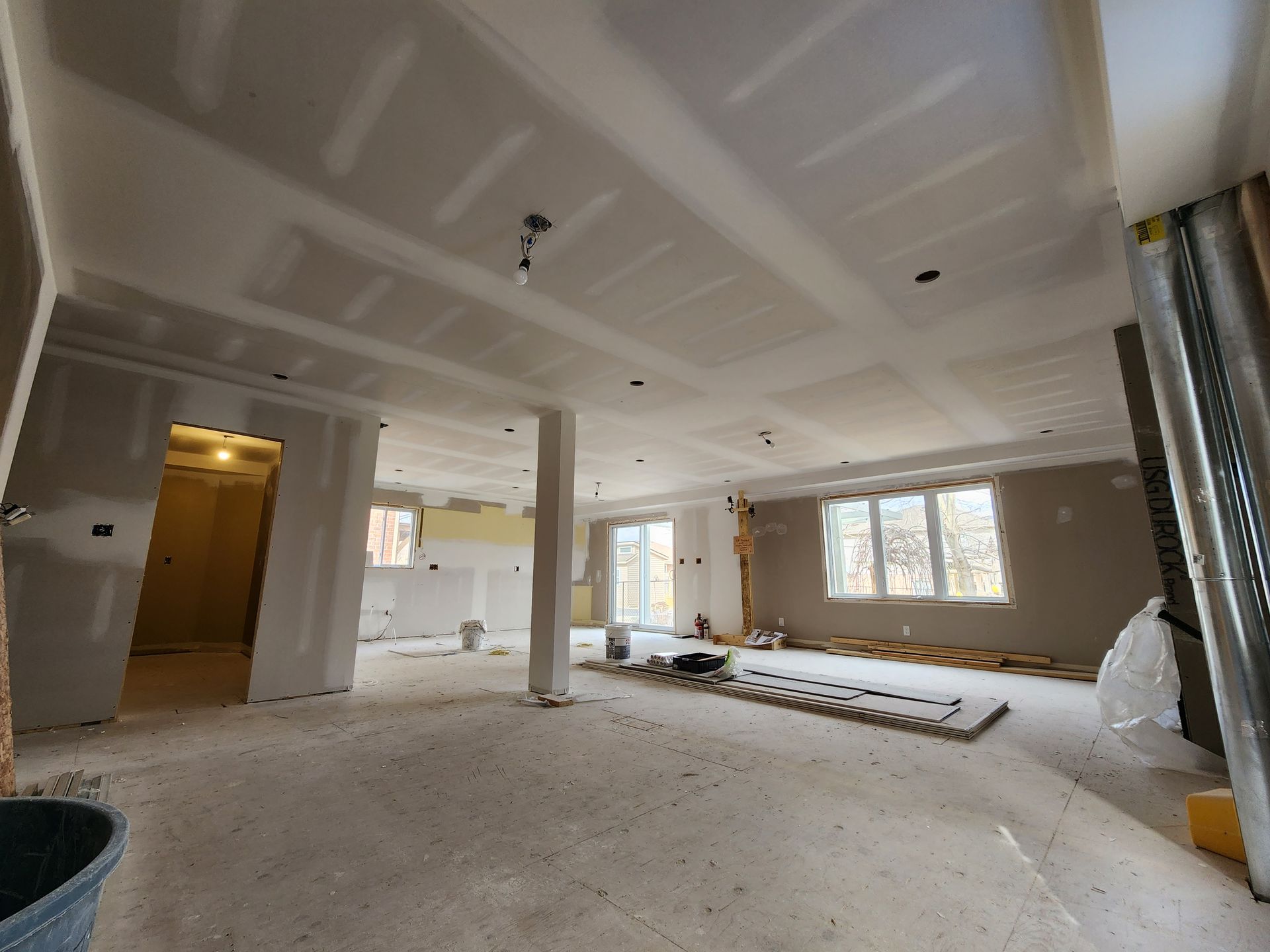 a large room with a lot of drywall on the ceiling