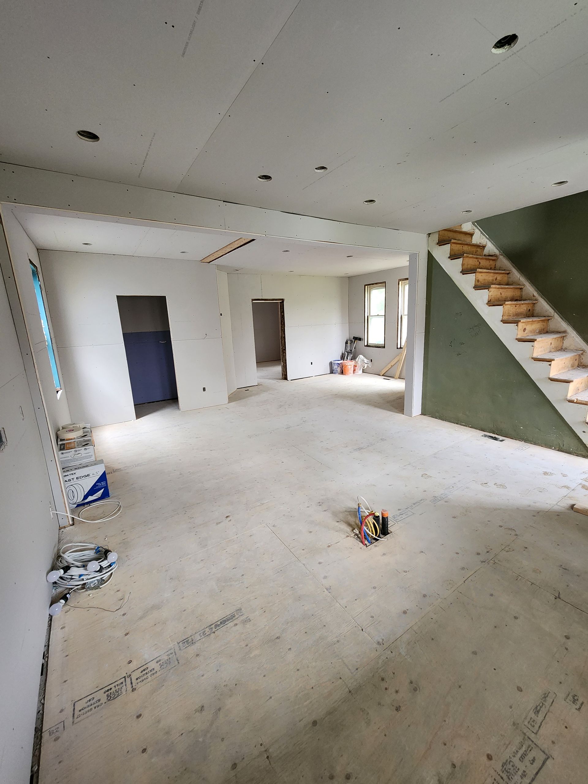 there is a staircase in the middle of the room .