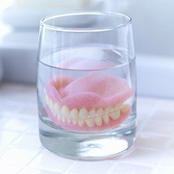 denture in a glass
