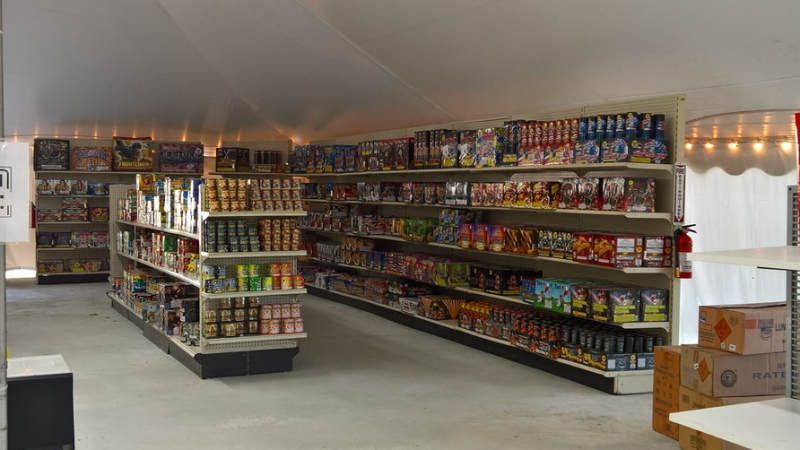 A grocery store aisle filled with lots of products