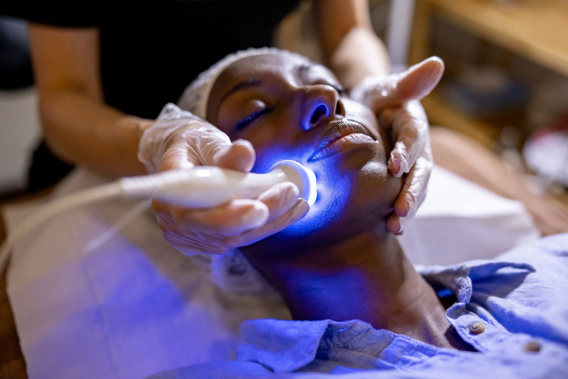 Laser Therapy On A Black Woman — Sevierville, TN — Greenbrier Medical & Spa
