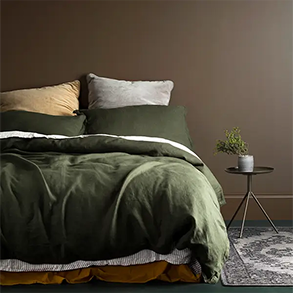 Bed With Dark Green Linen Bedding — GV painting in Shepparton, VIC