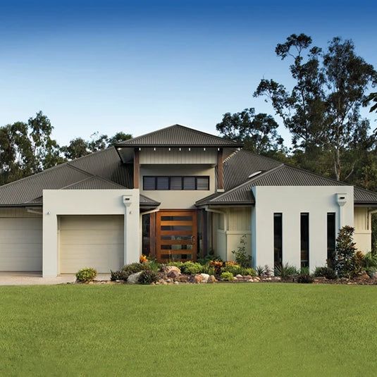 Modern house with cream facade, gray roof, and landscaped yard — GV painting in Shepparton, VIC
