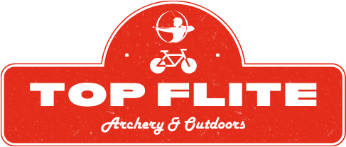 A red sign that says top flite archery and outdoors