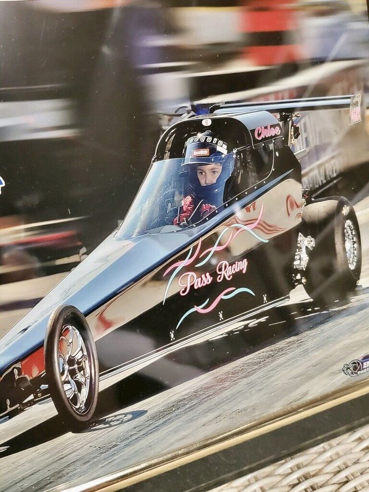 A Girl is Driving a Race Car that Says Pass Racing — Smyrna, GA — All Pro Transmission