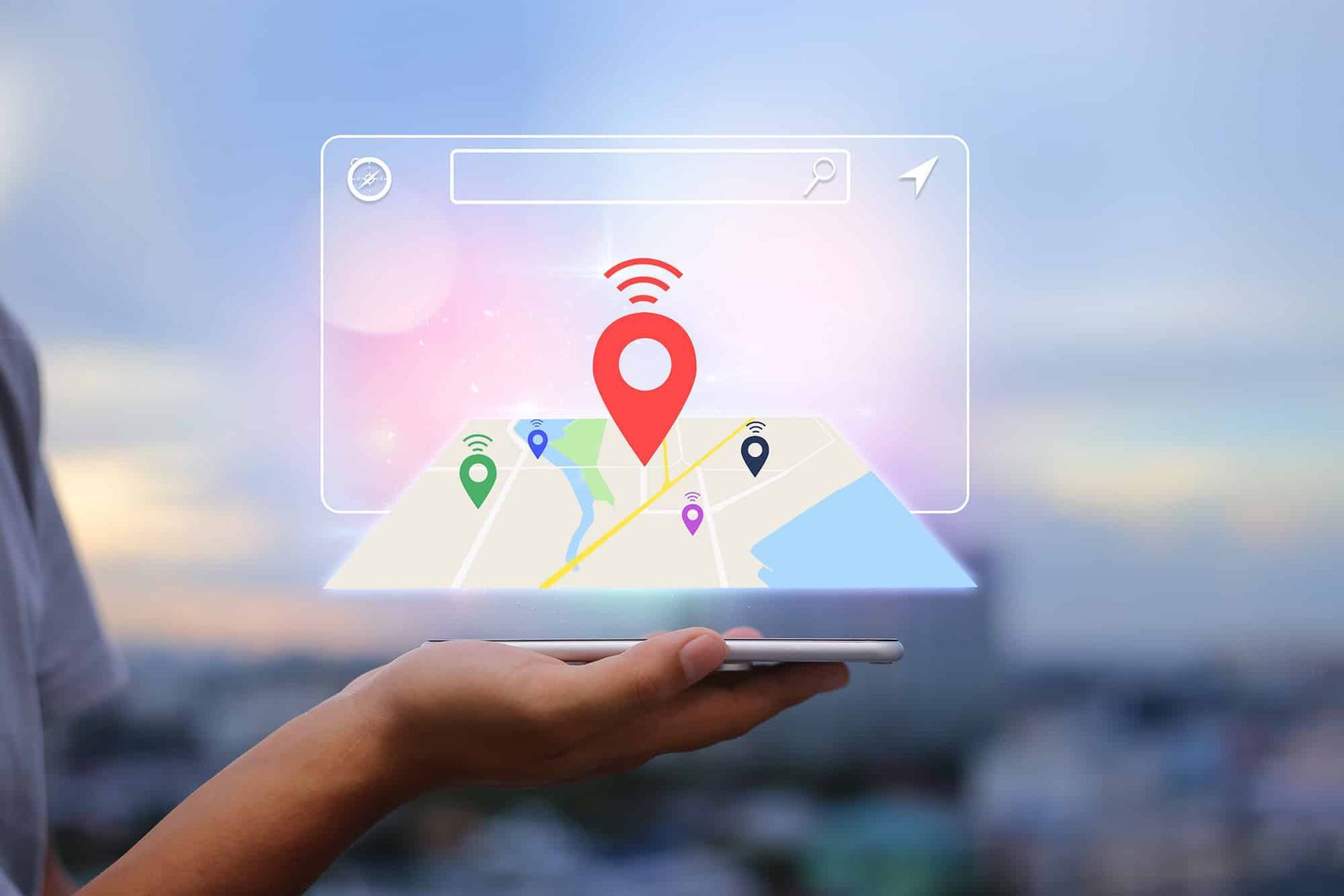 A person is holding a tablet with a map on it.