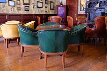 Chairs in a bar that were upholstered by Stirk Bridge Upholstery