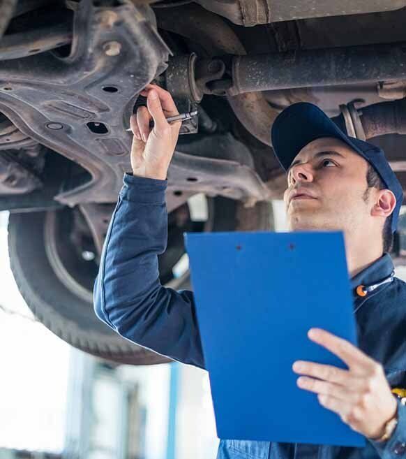 Mechanic Checking Under Car — Mechanic in Caloundra, QLD