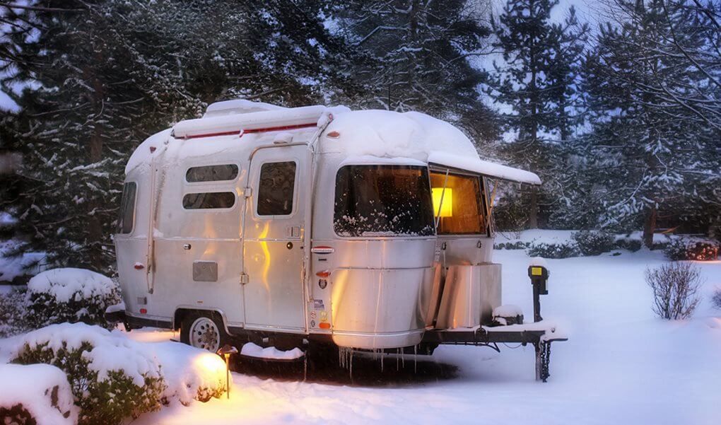 Travel trailer in the winter snow