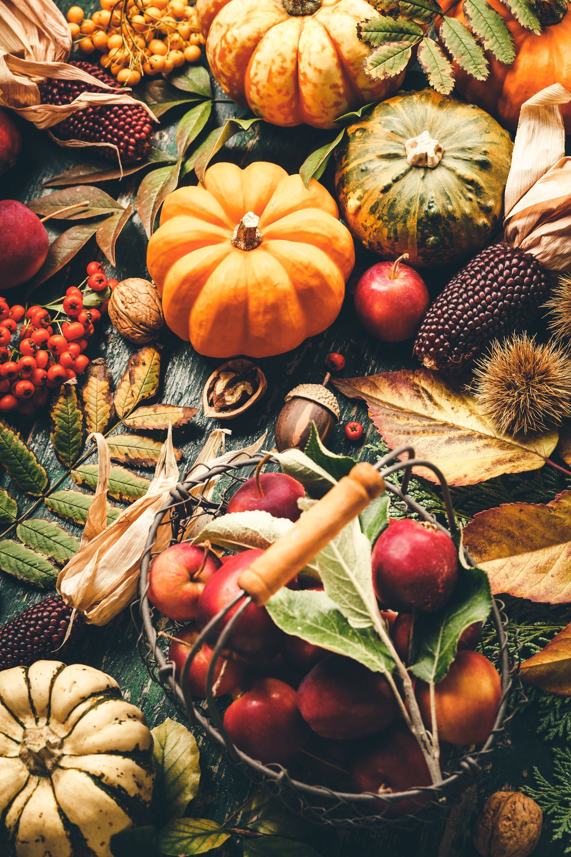 There are many different types of fruits and vegetables on the table.