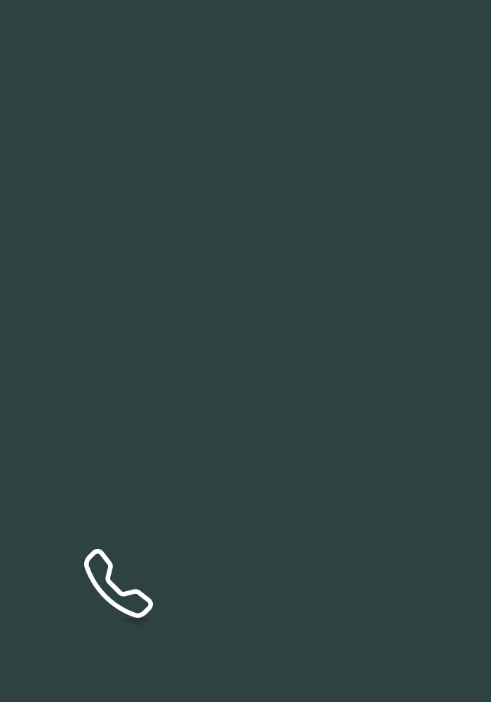 White telephone handset icon on a dark green background.