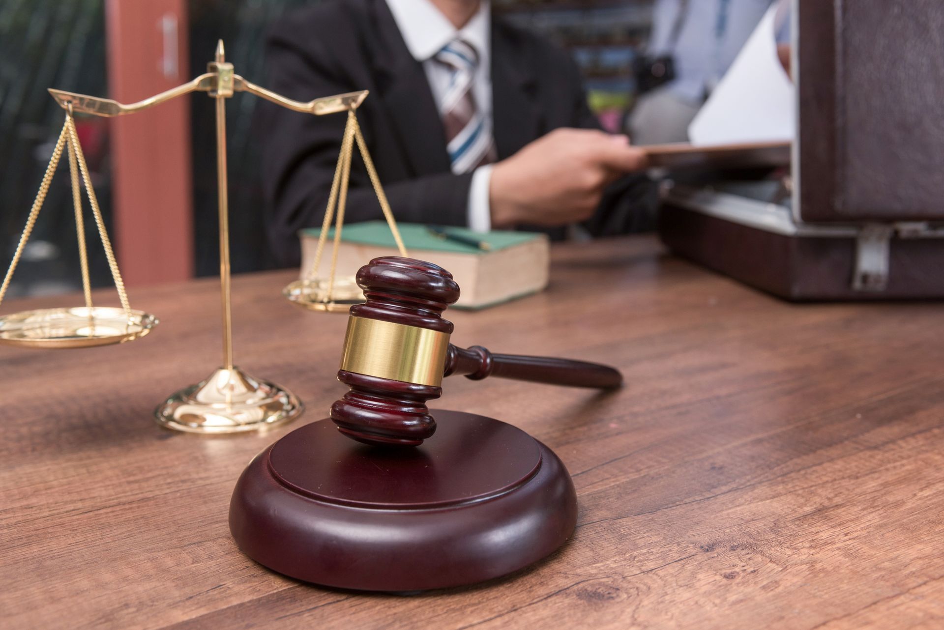 A person writing on a book | Wills And Trust Dispute Lawyer in Eugene, OR