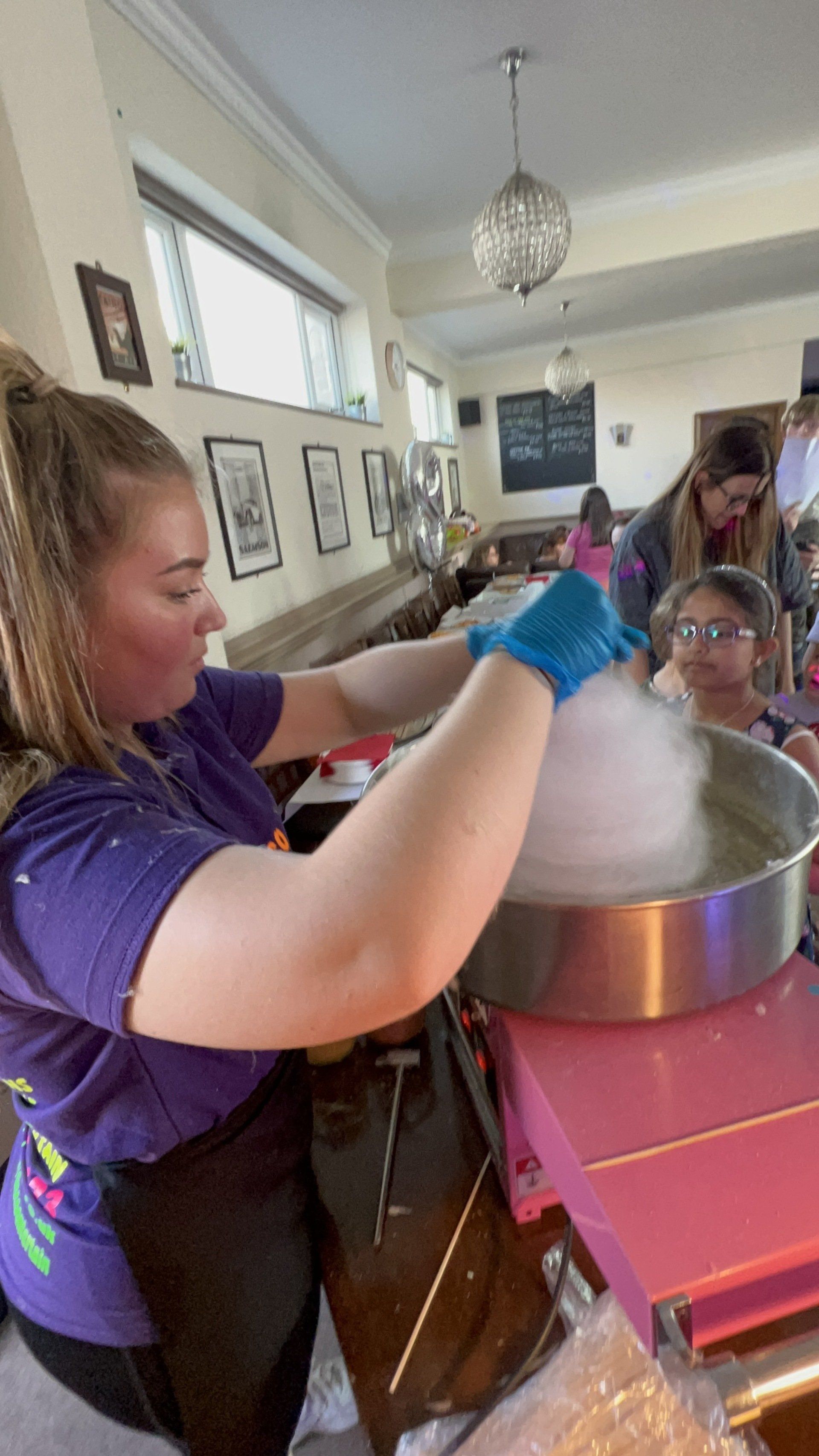 One of our staff members making candyfloss