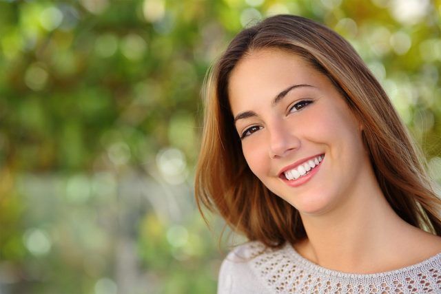 beautiful woman smiling outdoors