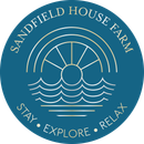 The logo for sandfield house farm says to stay explore and relax